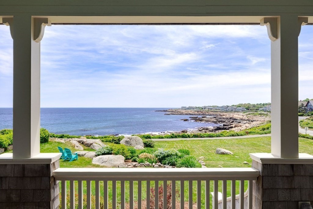 7 Bass Rocks Road Gloucester, MA 01930 - Photo 10 of 36 a view of a lush green field with a small yard