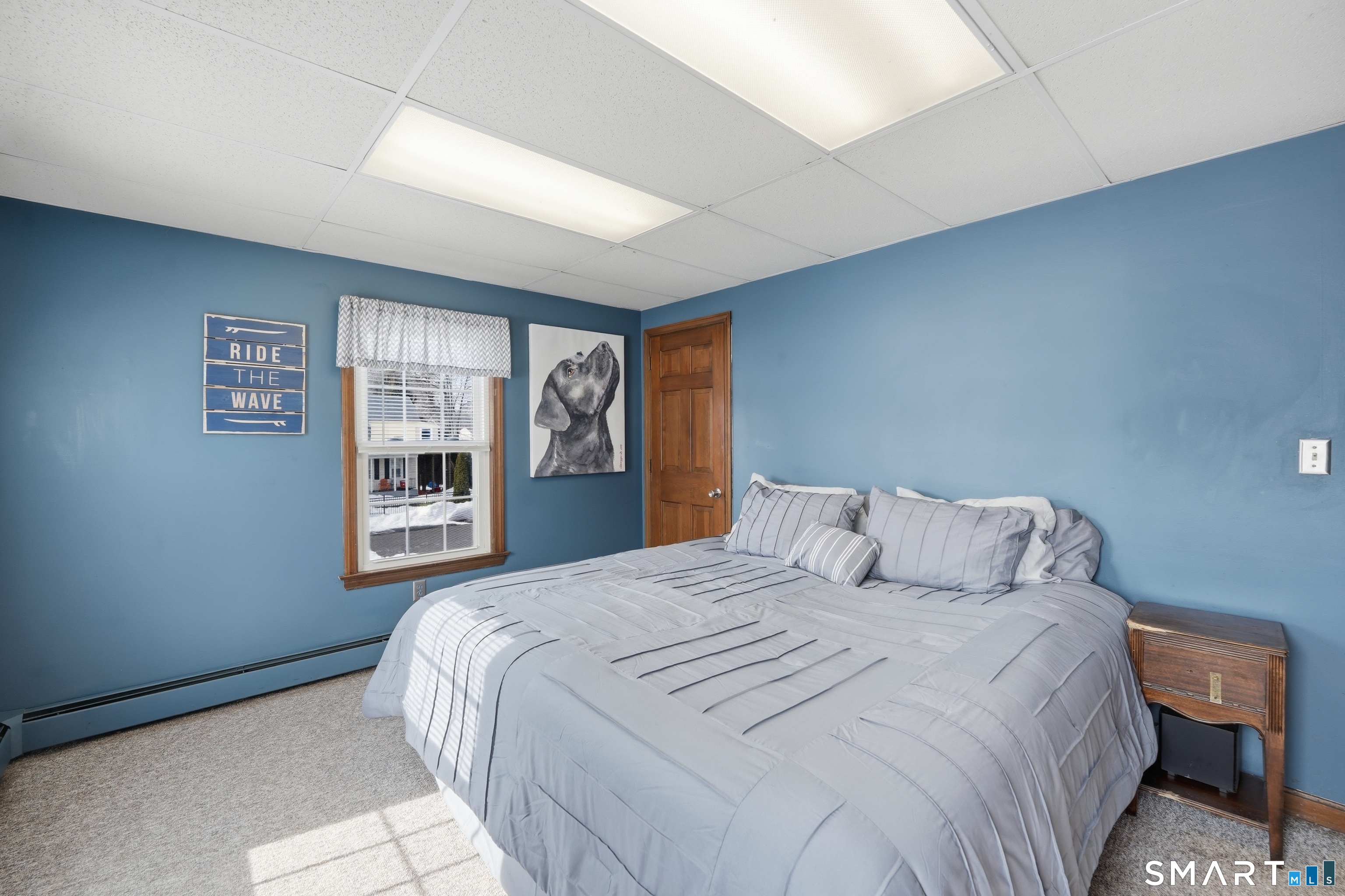 66 Maple Avenue Windsor, CT 06095 - Photo 13 of 38 a bedroom with a bed and a window