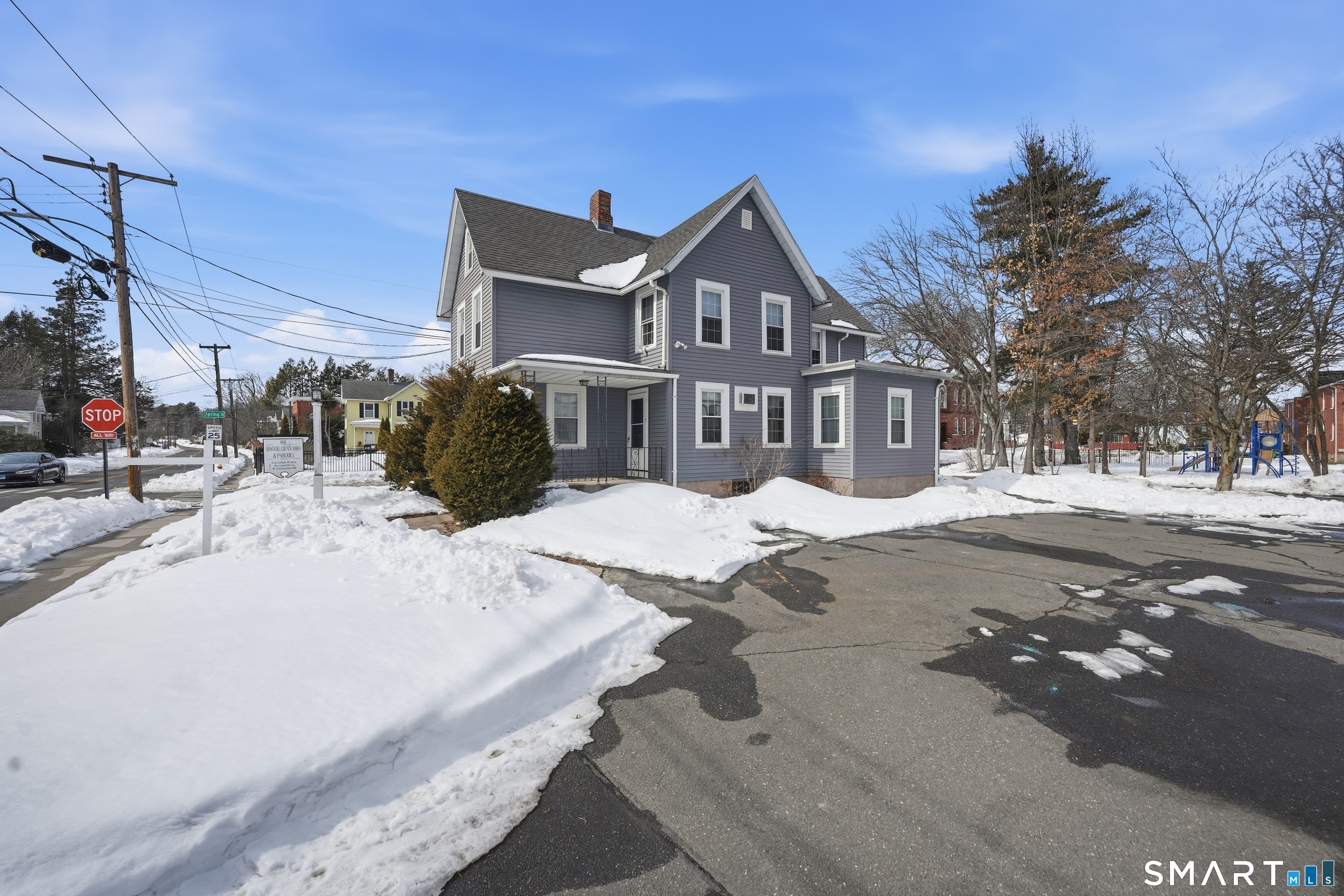 66 Maple Avenue Windsor, CT 06095 - Photo 2 of 38 a view of a street with houses