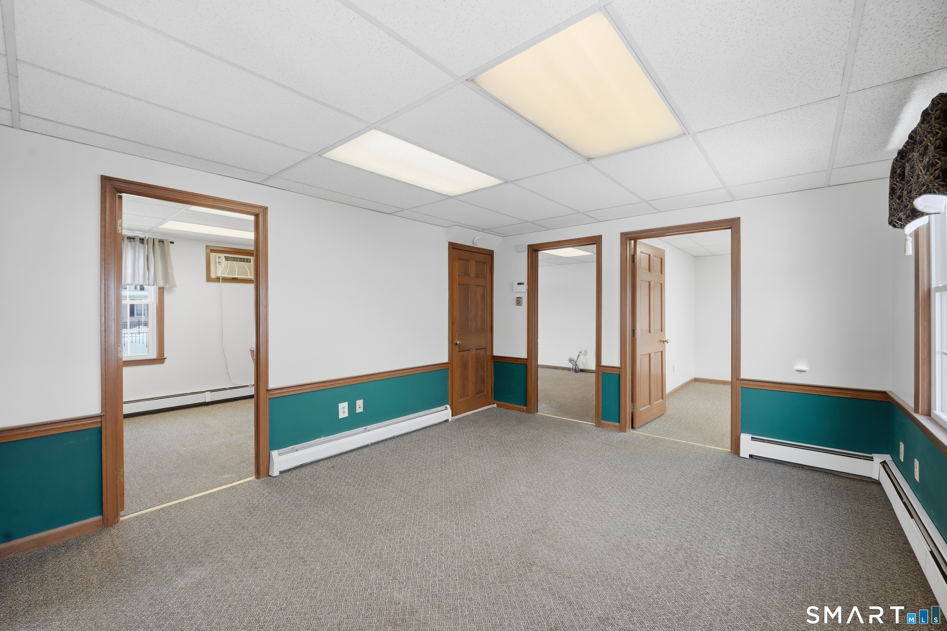 66 Maple Avenue Windsor, CT 06095 - Photo 28 of 38 a view of an empty room with a window