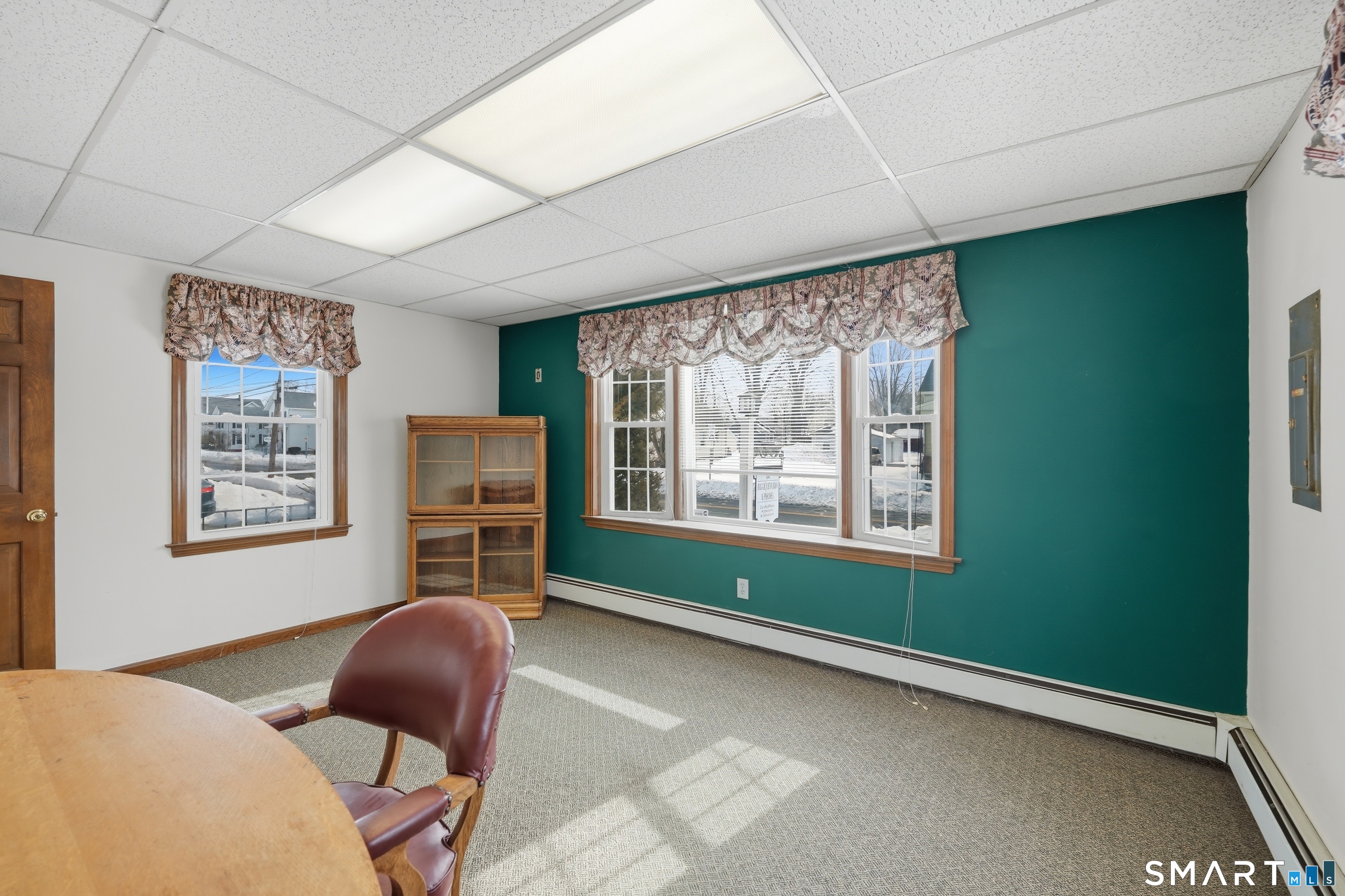 66 Maple Avenue Windsor, CT 06095 - Photo 33 of 38 a bedroom with furniture and a window