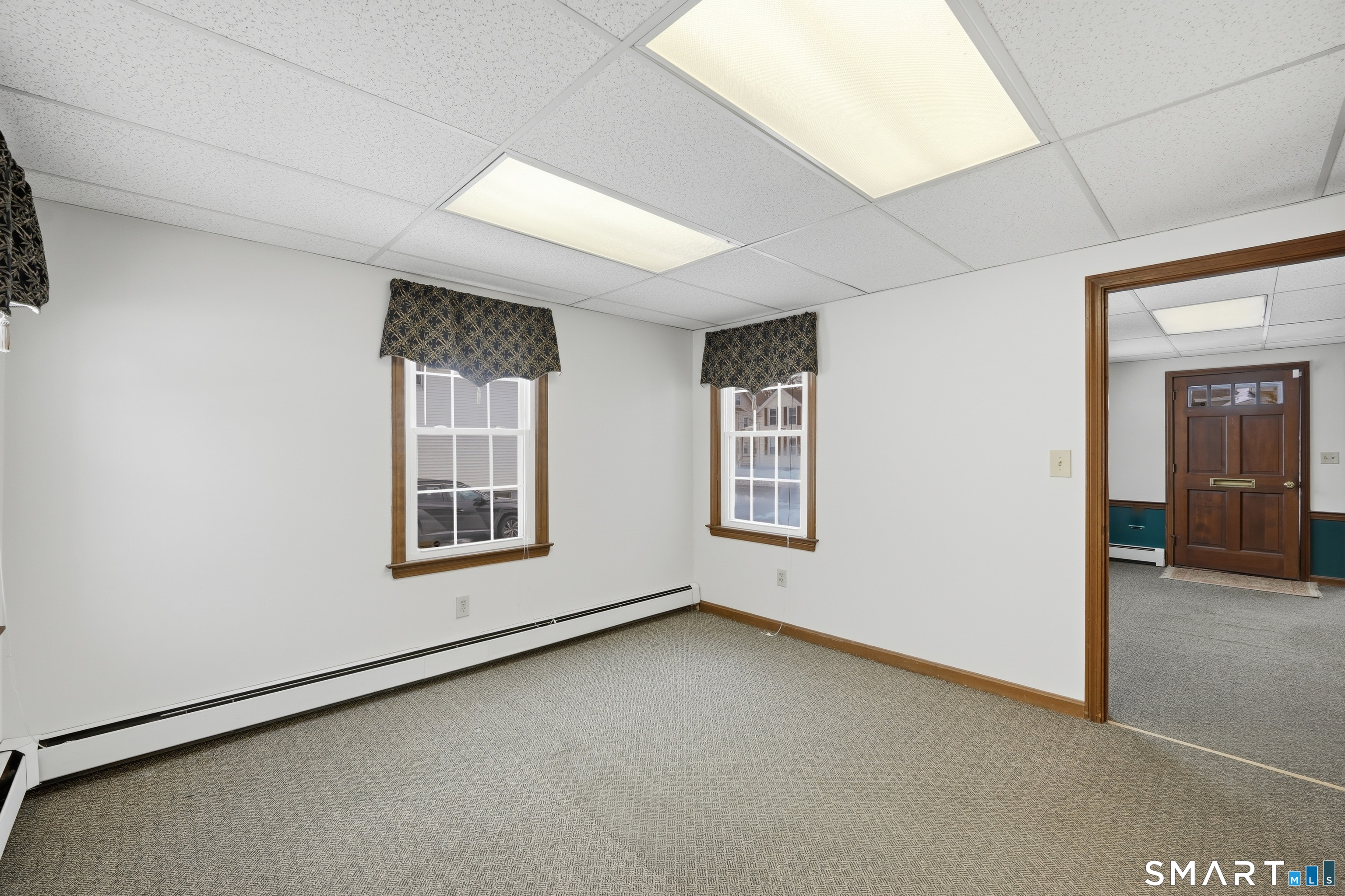 66 Maple Avenue Windsor, CT 06095 - Photo 34 of 38 an empty room with windows