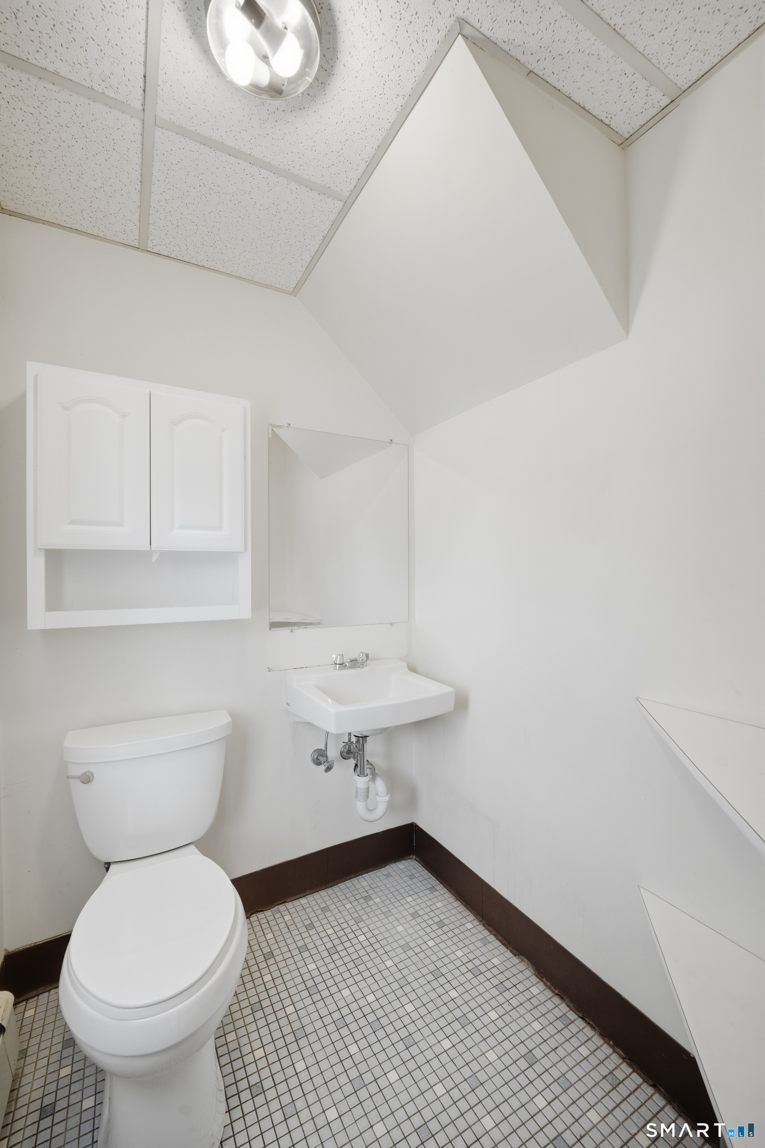 66 Maple Avenue Windsor, CT 06095 - Photo 38 of 38 a bathroom with a toilet and a sink