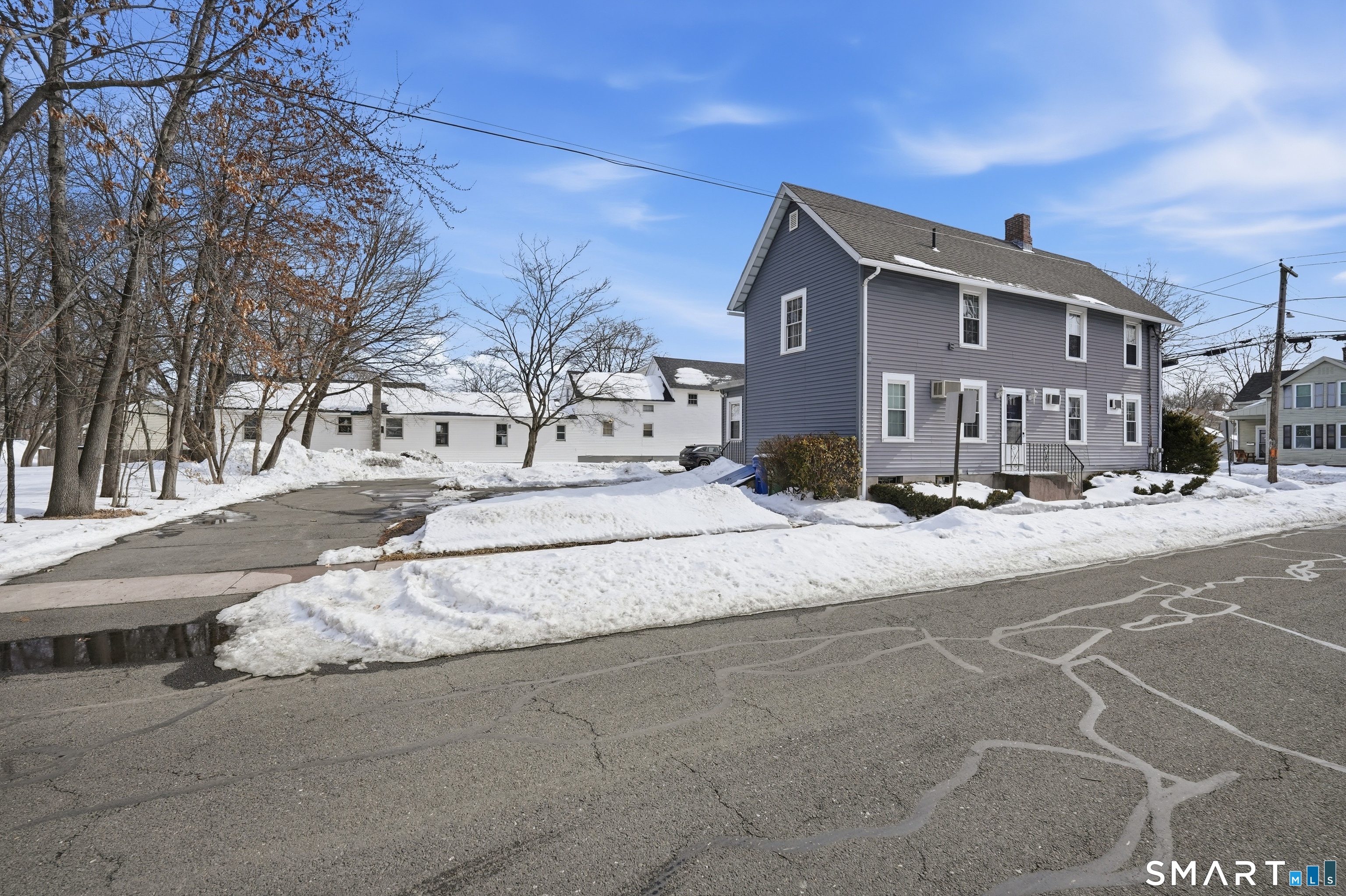 66 Maple Avenue Windsor, CT 06095 - Photo 5 of 38 a view of city with tall buildings