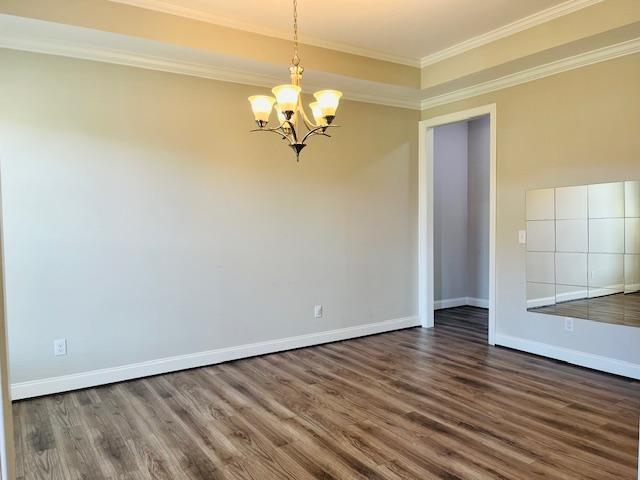 1717 Banks View Drive Raleigh, NC 27603 - Photo 7 of 33 a view of a room with wooden floor and a ceiling fan