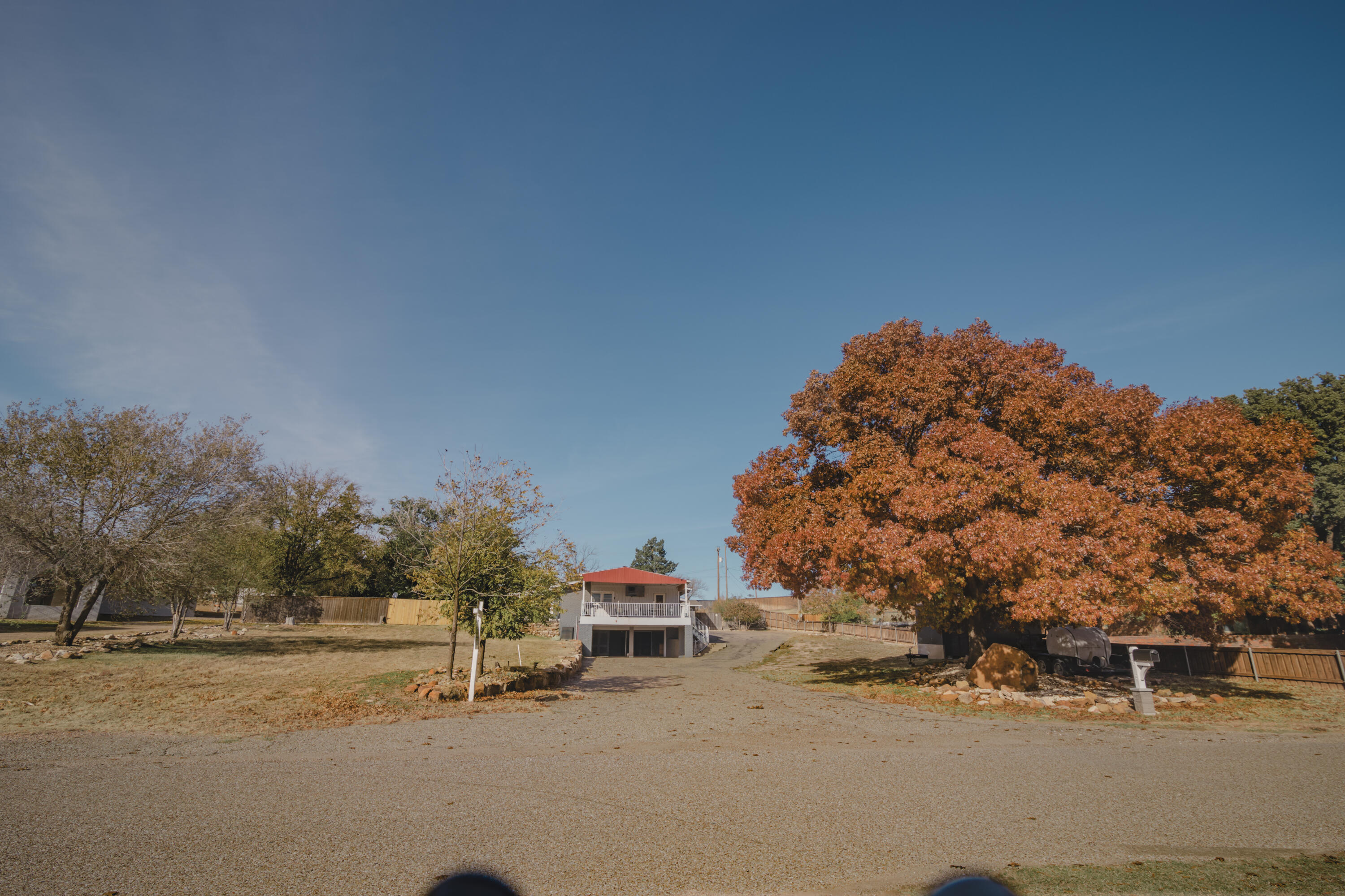 3407 Canyon Road Lubbock, TX 79403 - Photo 2 of 37 a view of a road with a building in the background