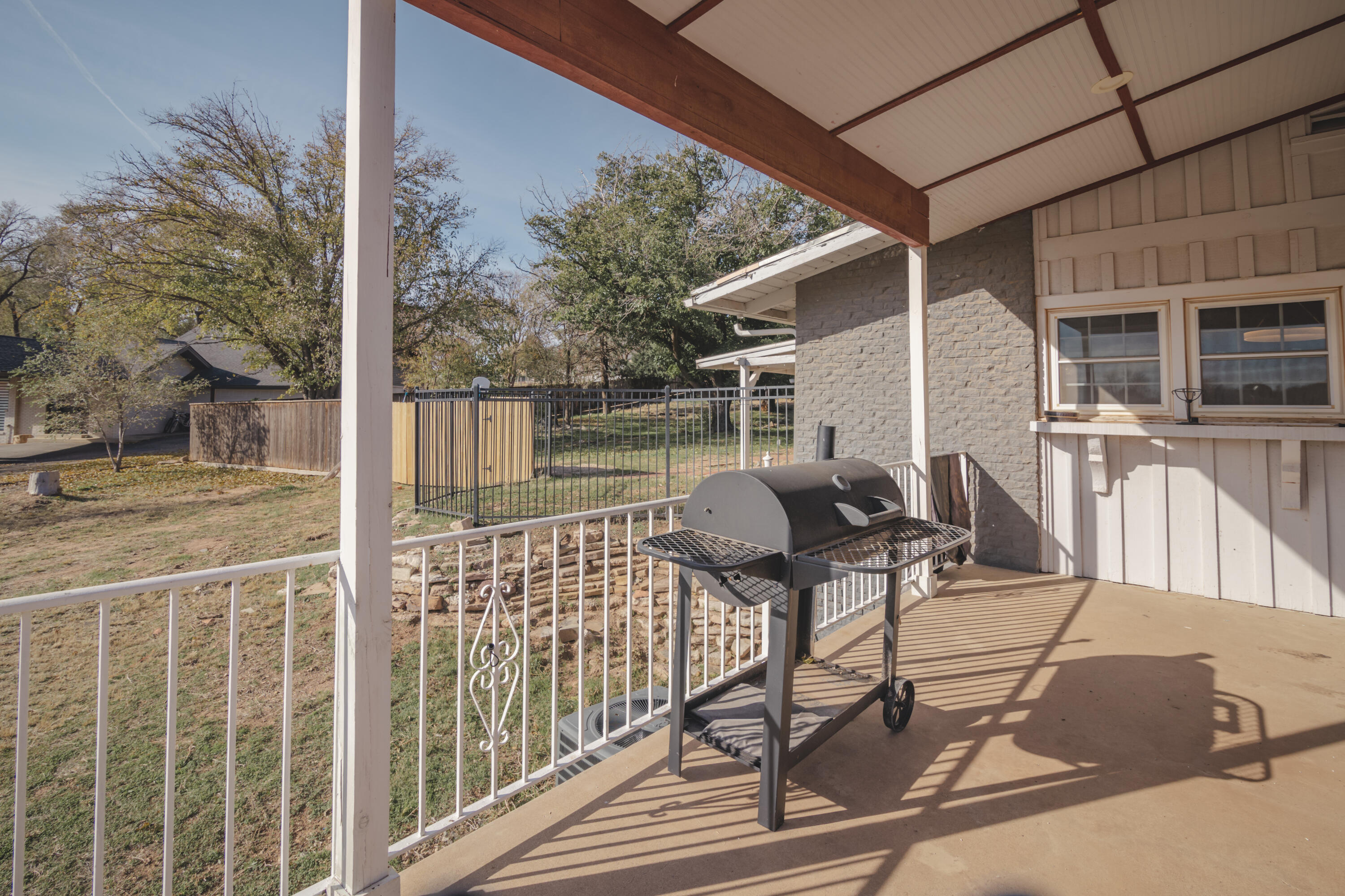 3407 Canyon Road Lubbock, TX 79403 - Photo 34 of 37 a view of balcony with wooden floor and seating space