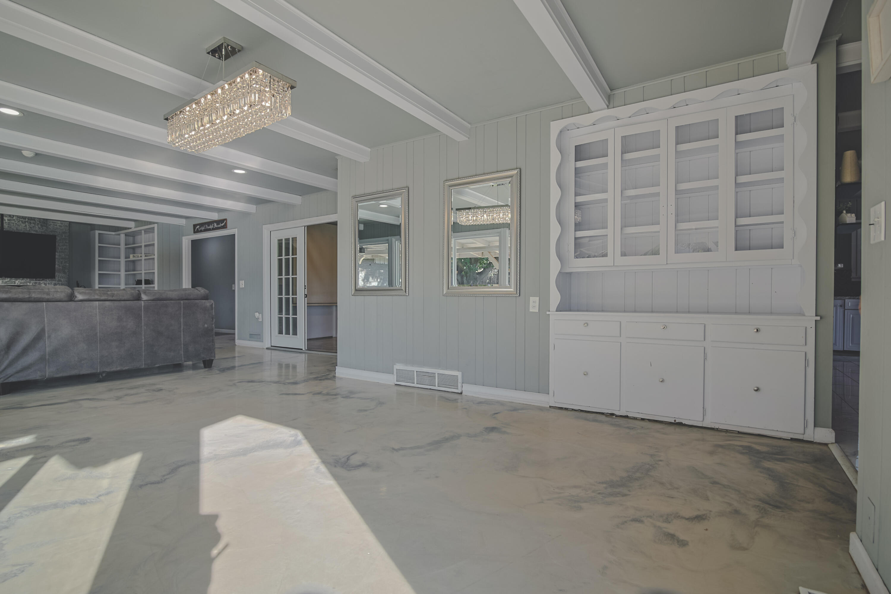 3407 Canyon Road Lubbock, TX 79403 - Photo 7 of 37 en empty room with windows and ceiling fan