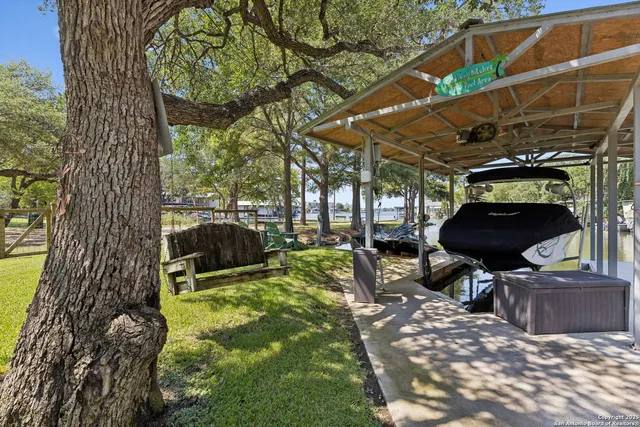 a view of a chairs and table in a patio
