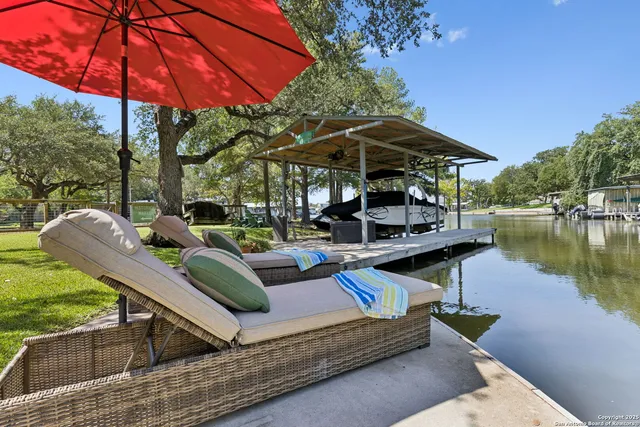 a view of a terrace with sitting area