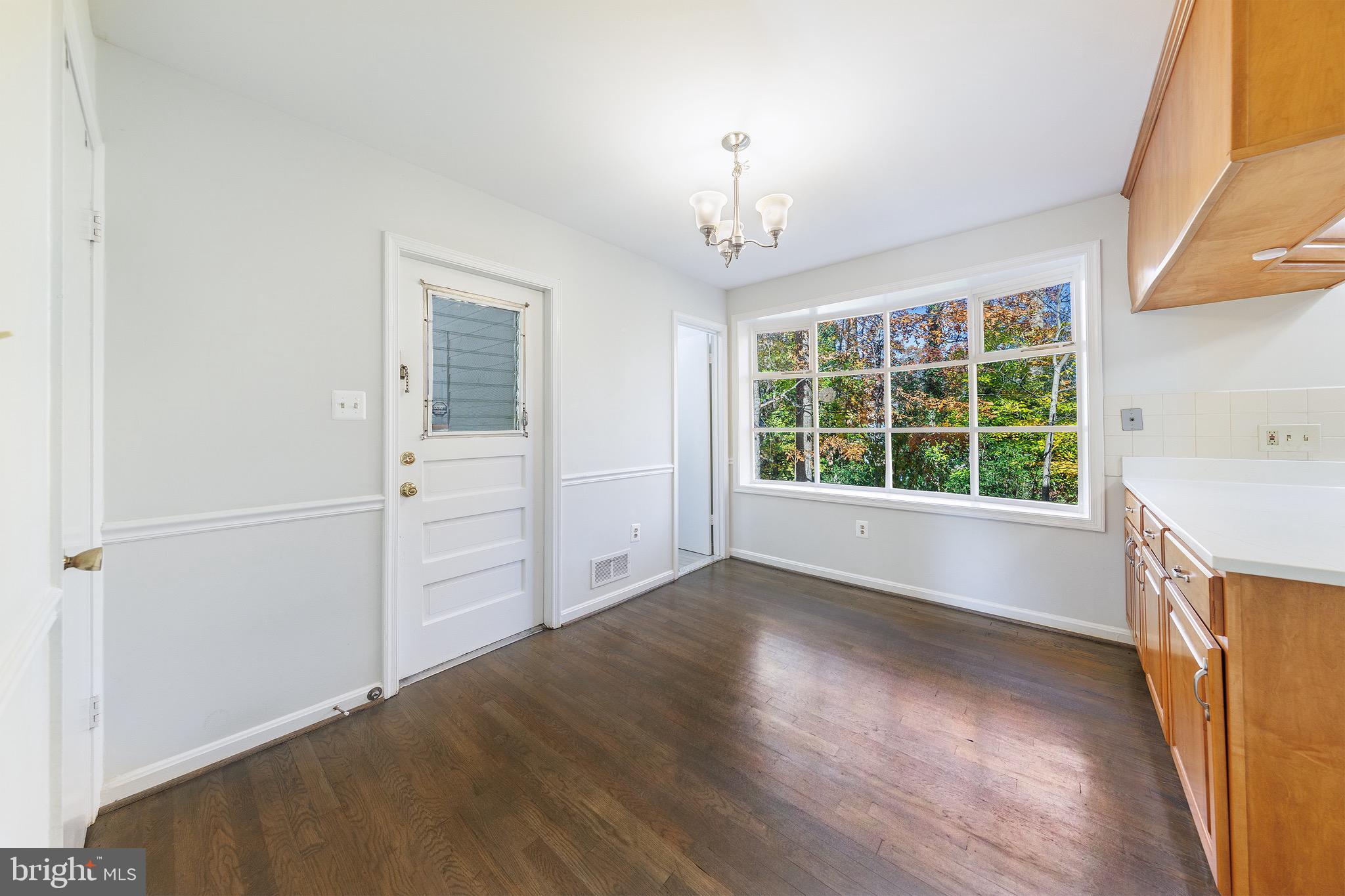 6800 Quebec Court Springfield, VA 22152 - Photo 8 of 44 Breakfast area exits to car port