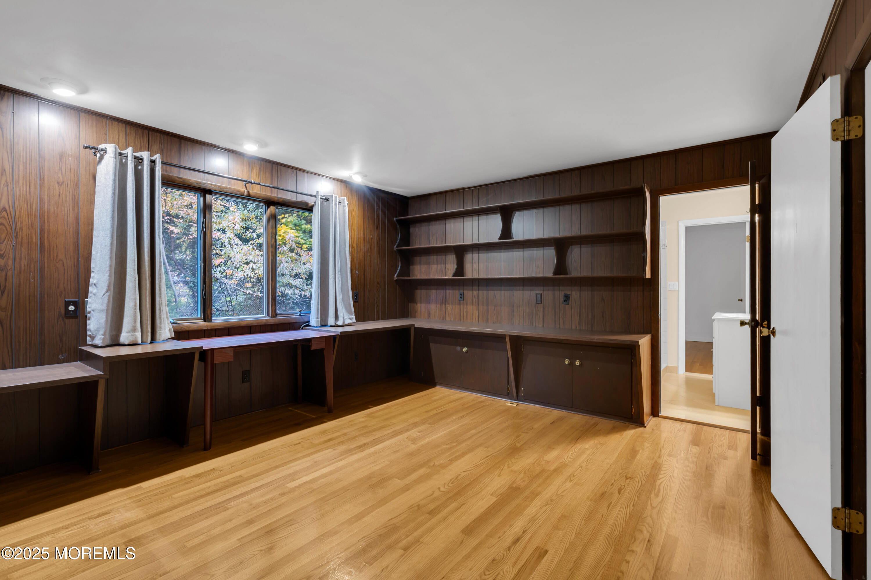 642 Rankin Road Brielle, NJ 08730 - Photo 30 of 59 a bedroom with a bed and a large window