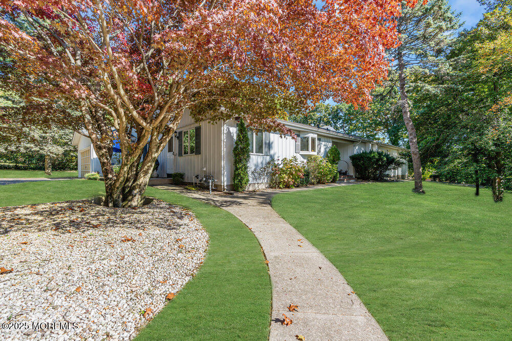 642 Rankin Road Brielle, NJ 08730 - Photo 50 of 59 a front view of a house with a yard