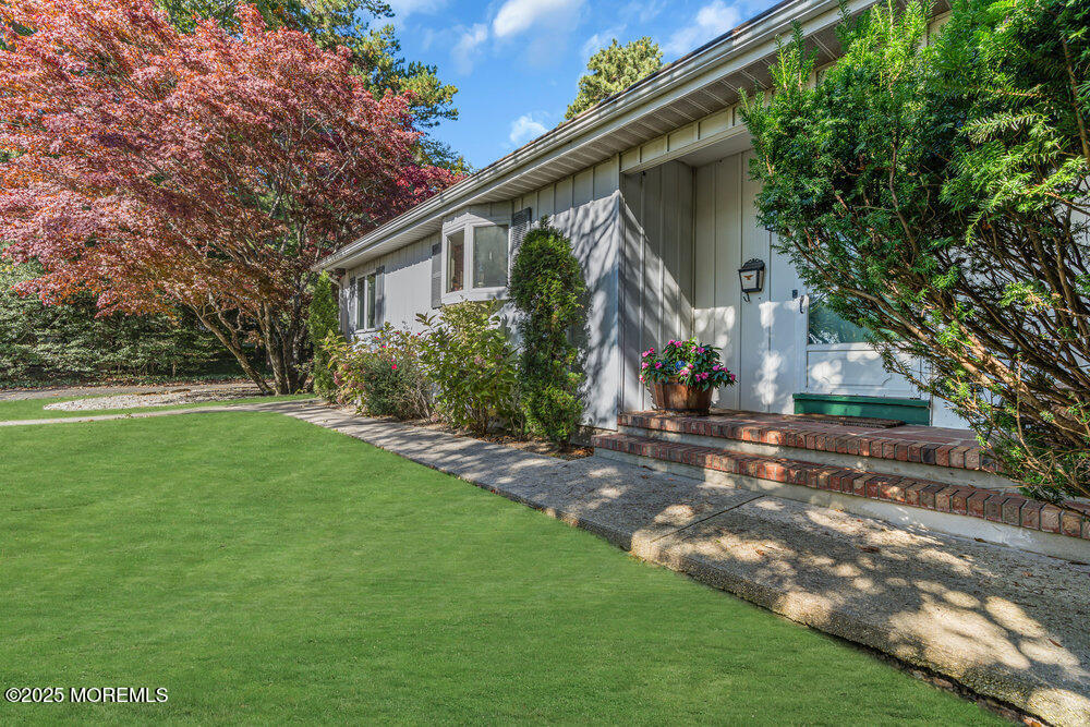642 Rankin Road Brielle, NJ 08730 - Photo 51 of 59 a view of a house with a yard