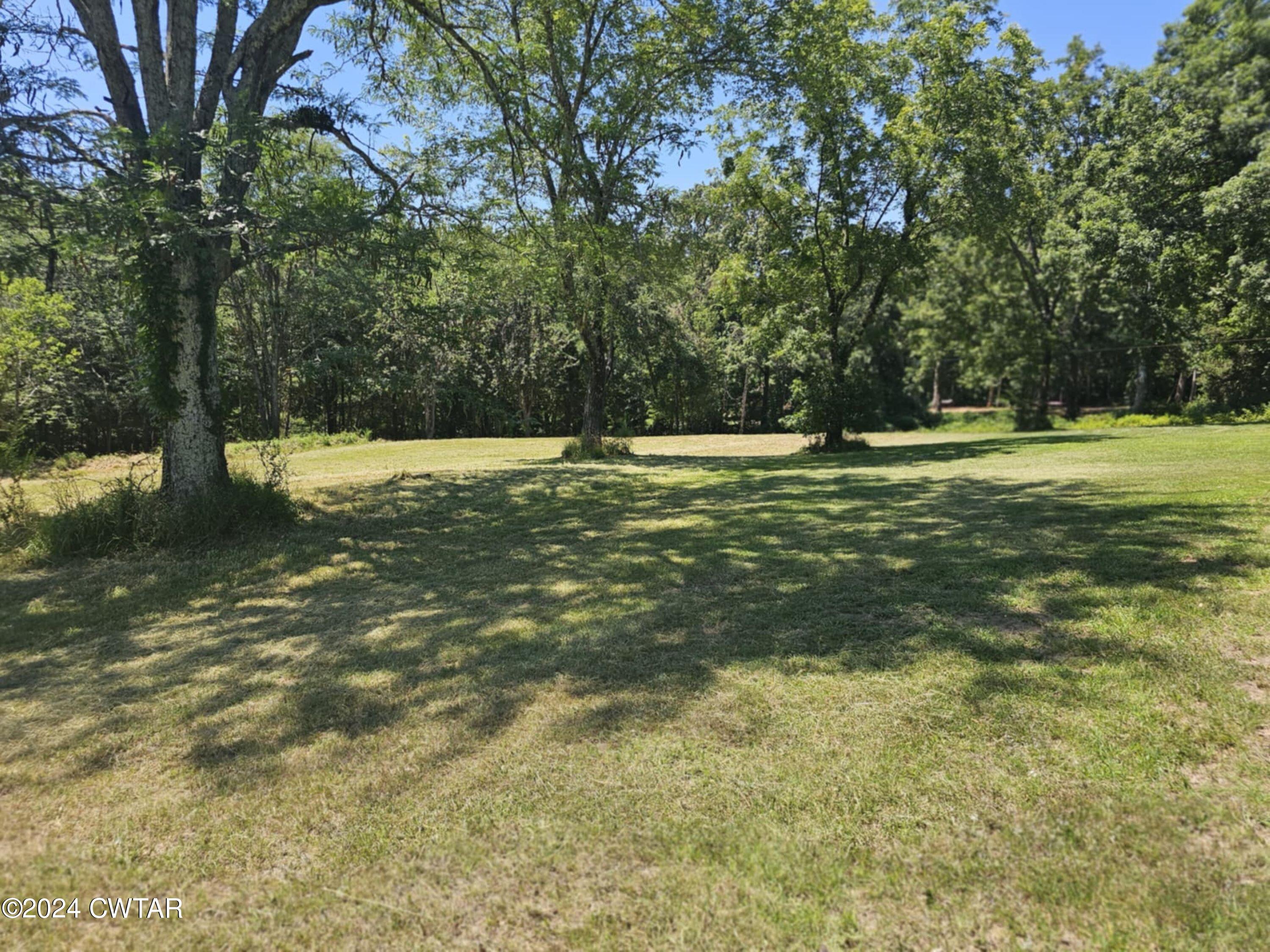 0 Riverside Drive Jackson, TN 38301 - Photo 8 of 14 a view of a water fountain and a bench