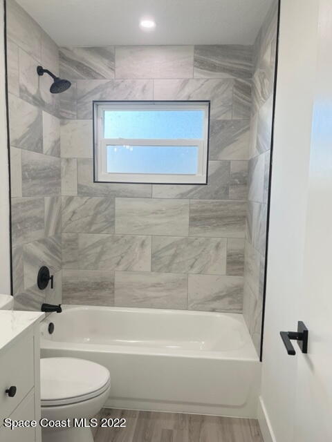 998 Cardon Drive Rockledge, FL 32955 - Photo 13 of 21 a bathroom with a toilet and a bathtub