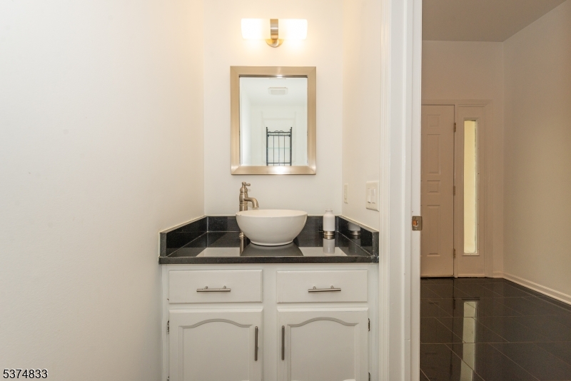 3 Avery Court Madison, NJ 07940 - Photo 17 of 50 a view of a sink and cabinets