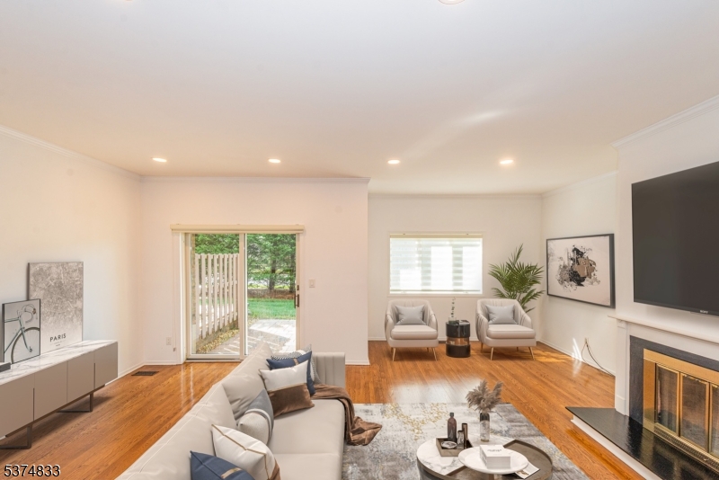 3 Avery Court Madison, NJ 07940 - Photo 26 of 50 a living room with furniture flat screen tv and a large window
