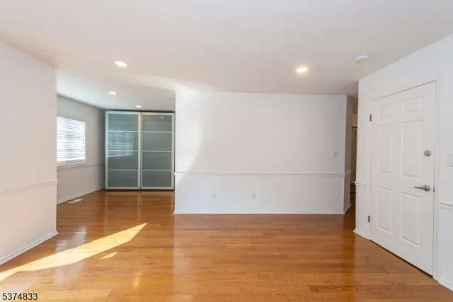 a bathroom with a shower and a glass door