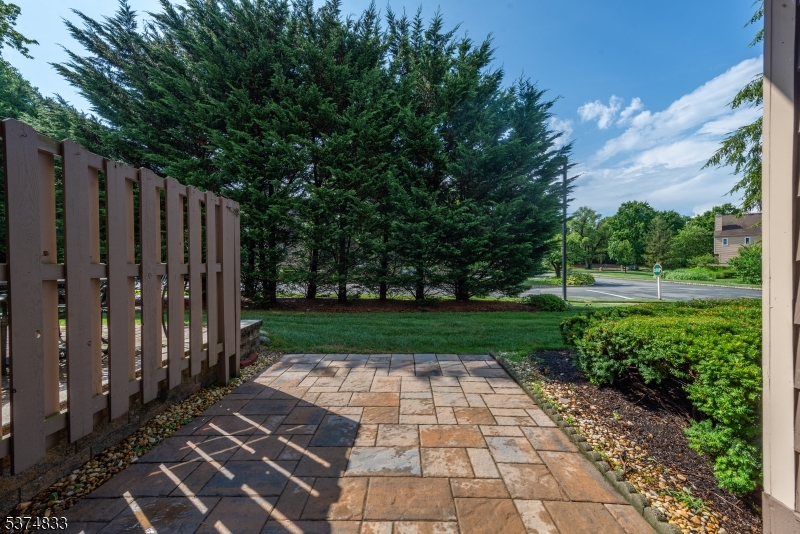 3 Avery Court Madison, NJ 07940 - Photo 49 of 50 a view of a backyard with wooden fence