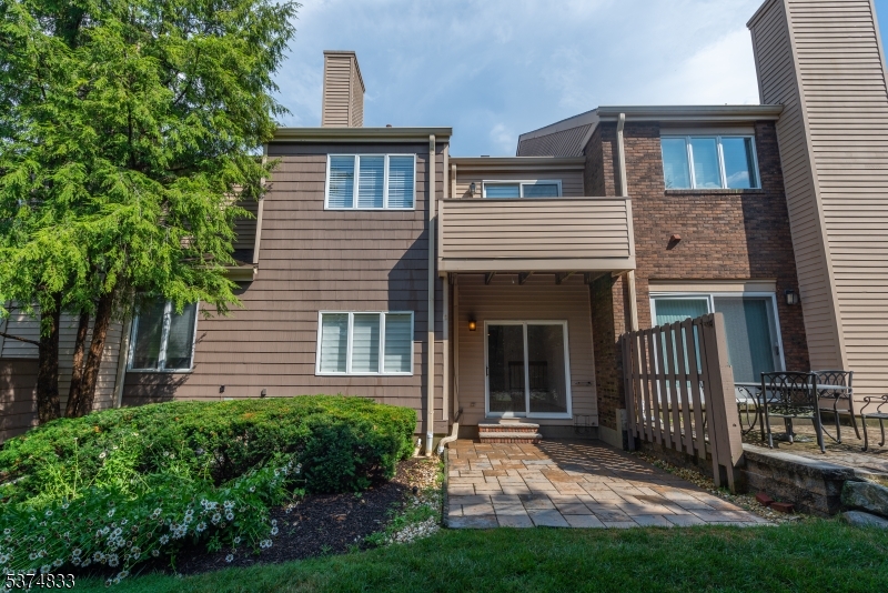 3 Avery Court Madison, NJ 07940 - Photo 50 of 50 a front view of a house with a garden