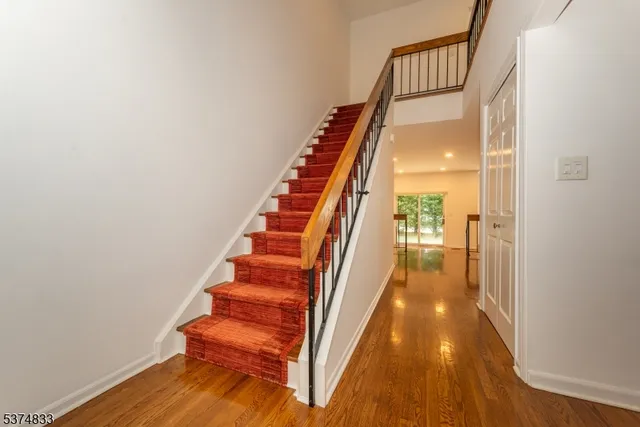 a view of hall with wooden floor