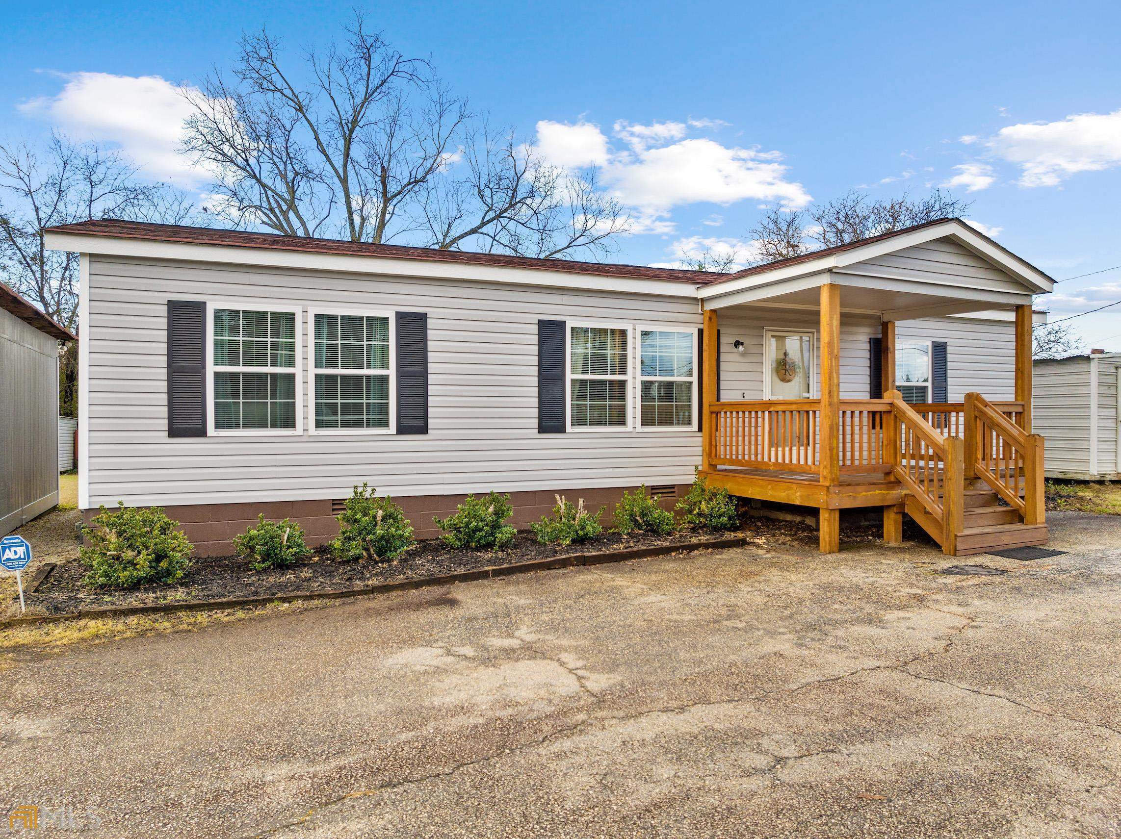 2265 Danielsville Road Athens, GA 30601 - Photo 1 of 1 a house with trees in the background