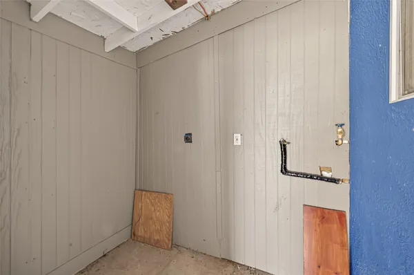 a bathroom with a shower and a shower