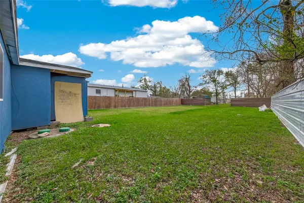 a view of a backyard with a garden