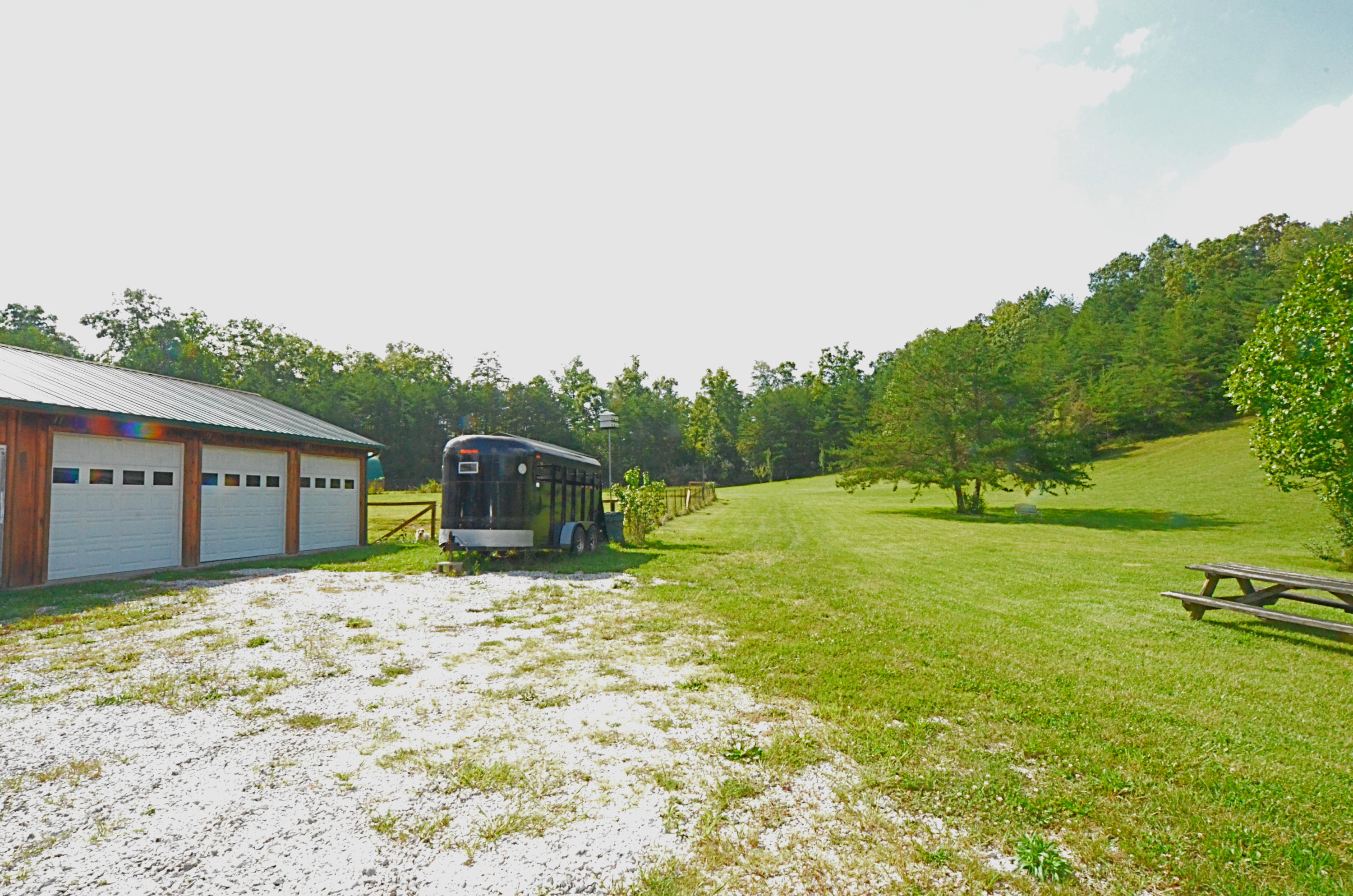 778 Church Road Pioneer, TN 37847 - Photo 19 of 38 Detached garage w/room for lots of toys!