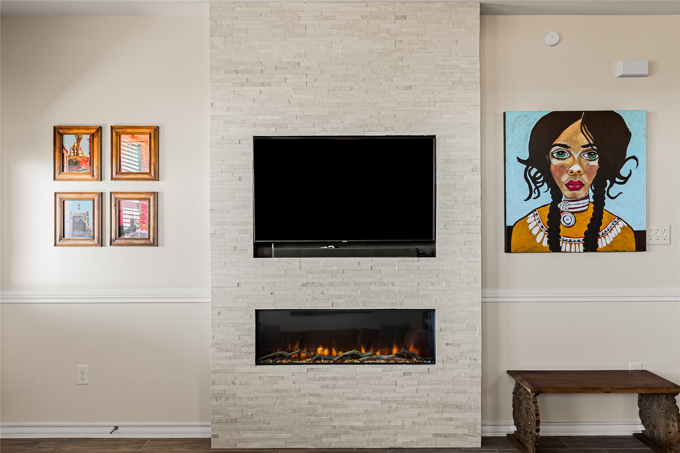 862 Pepperbark Loop Buda, TX 78610 - Photo 14 of 40 a living room with a fireplace and a flat screen tv
