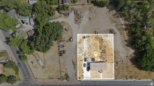 426 North Locust Avenue Lindon, UT 84042 - Photo 5 of 9 Aerial view showcasing a rectangular residential parcel with a single-story structure