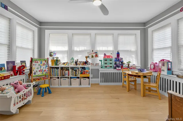 a view of a room with lots of furniture