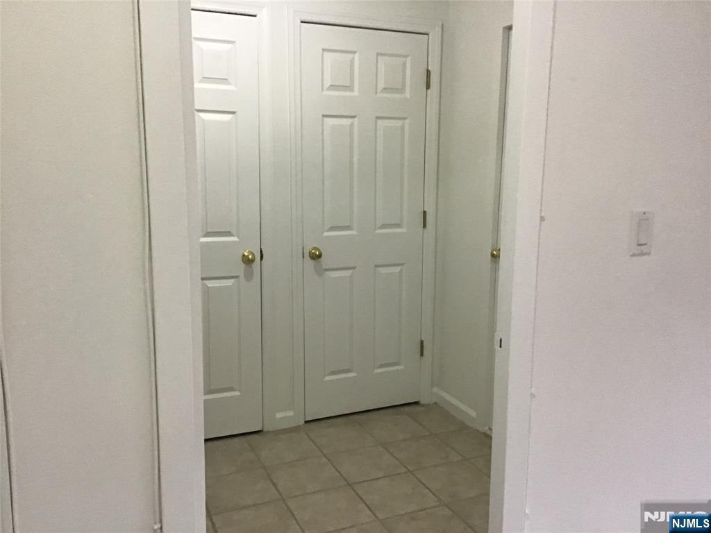 1203 River Road, Unit 21M Edgewater, NJ 07020 - Photo 5 of 12 a view of a bathroom