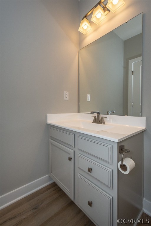 4100 Maze Runner Drive, Unit 406 Midlothian, VA 23112 - Photo 19 of 34 a bathroom with a sink and a mirror