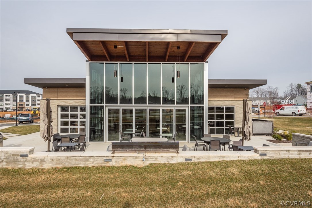 4100 Maze Runner Drive, Unit 406 Midlothian, VA 23112 - Photo 24 of 34 a view of a house with a swimming pool