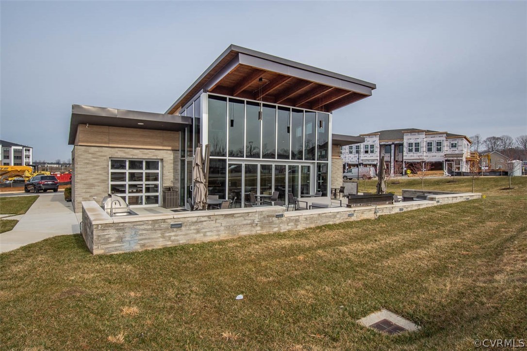 4100 Maze Runner Drive, Unit 406 Midlothian, VA 23112 - Photo 26 of 34 a view of house with a swimming pool