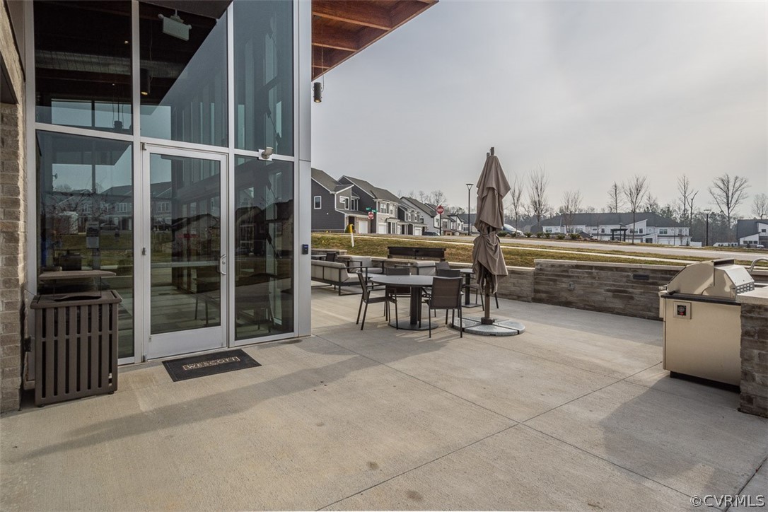4100 Maze Runner Drive, Unit 406 Midlothian, VA 23112 - Photo 28 of 34 a view of a terrace with chairs