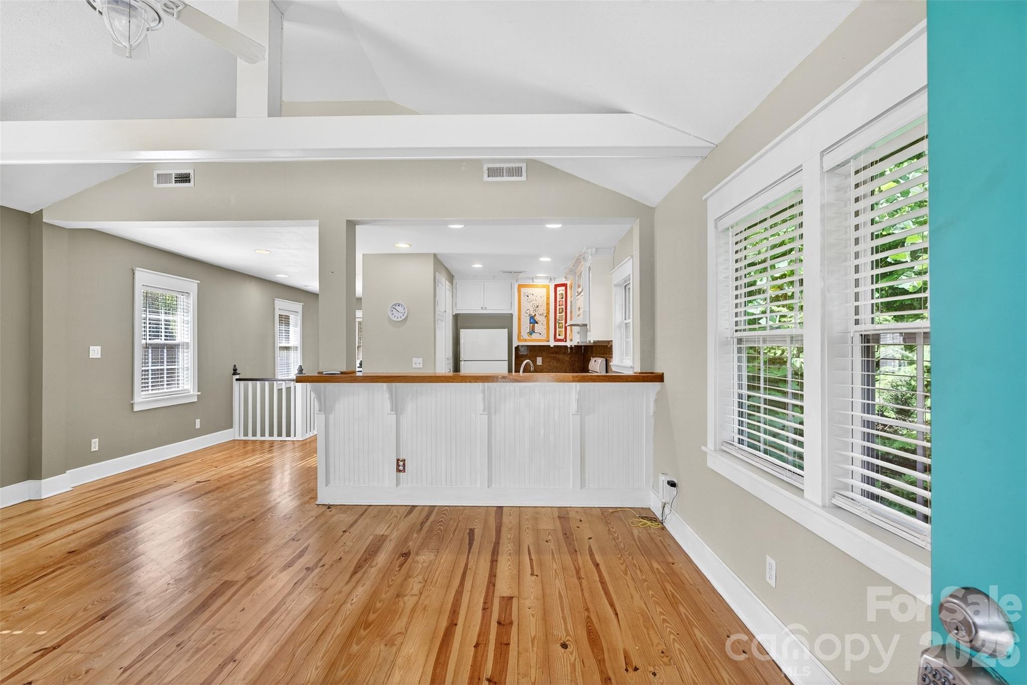160 East Howard Street Tryon, NC 28782 - Photo 7 of 48 a view of kitchen with cabinets and wooden floor