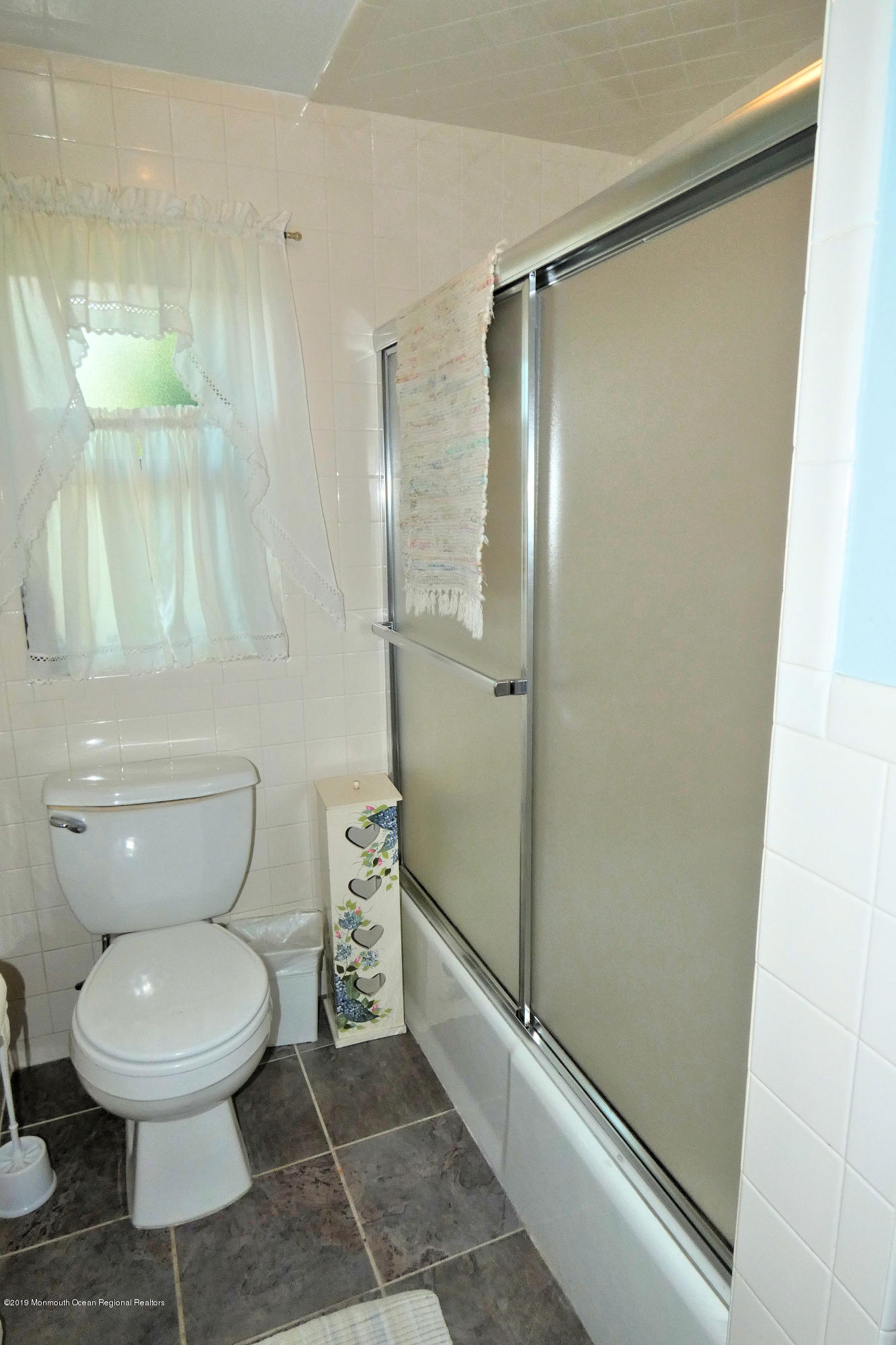 44 Las Vegas Road Lavallette, NJ 08735 - Photo 11 of 18 a bathroom with a toilet and a shower