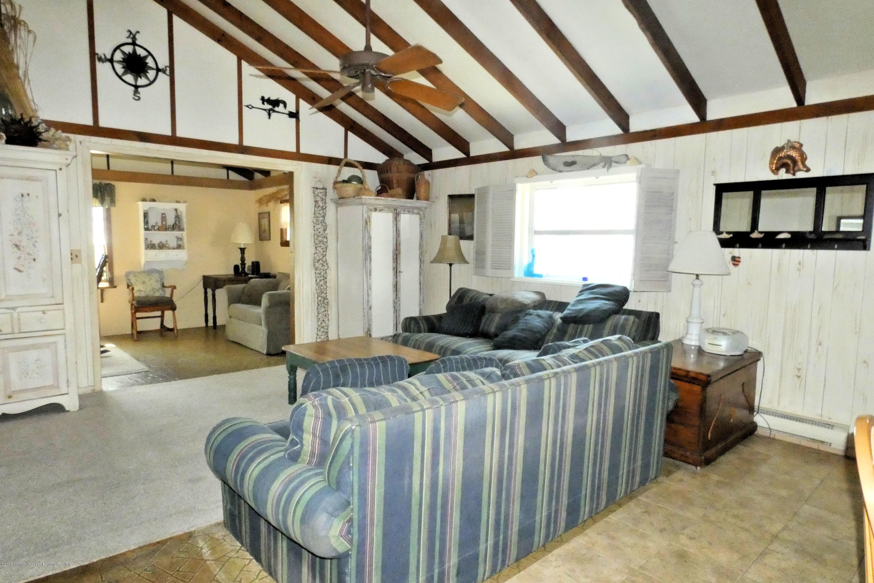 44 Las Vegas Road Lavallette, NJ 08735 - Photo 3 of 18 a living room with furniture