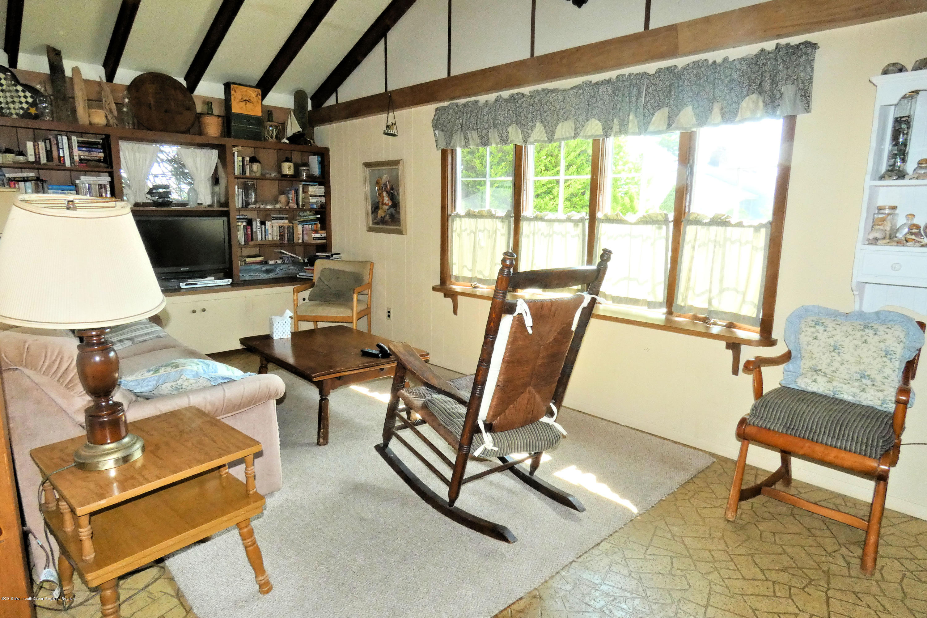44 Las Vegas Road Lavallette, NJ 08735 - Photo 7 of 18 a work room with furniture and a large window