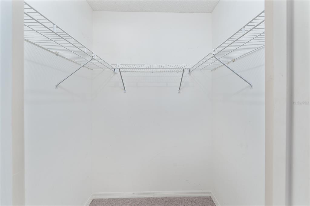 9499 Southeast 174th Loop Summerfield, FL 34491 - Photo 36 of 46 a view of small space with racks on the wall