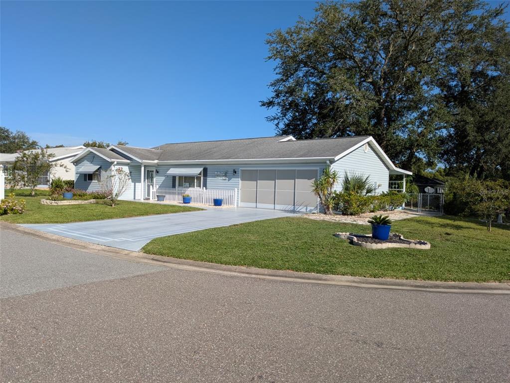 9499 Southeast 174th Loop Summerfield, FL 34491 - Photo 4 of 46 a view of outdoor space yard and front view of a house