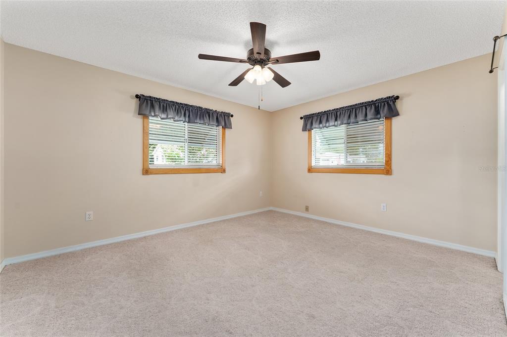 9499 Southeast 174th Loop Summerfield, FL 34491 - Photo 41 of 46 a view of an empty room with a window
