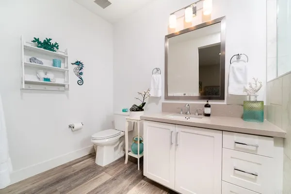 a view of a patio with table and chairs