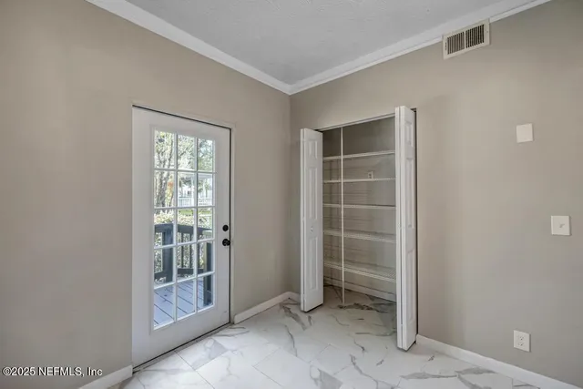 an empty room with windows