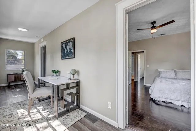 a workspace with furniture and window