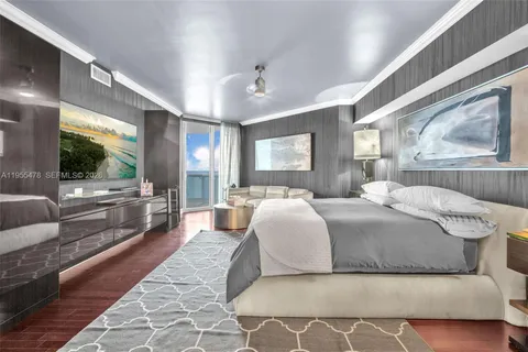 a view of a house with swimming pool and sitting area