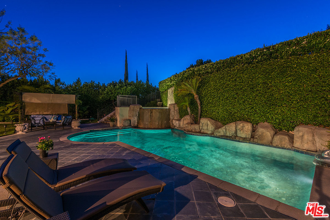 13981 Aubrey Road Beverly Hills, CA 90210 - Photo 12 of 20 a view of a backyard with sitting area
